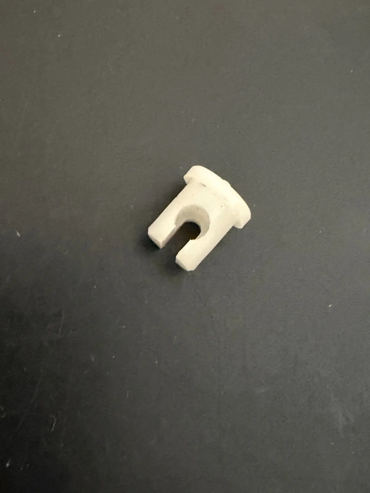 Oil Pump Cable Retainer, Nos 1