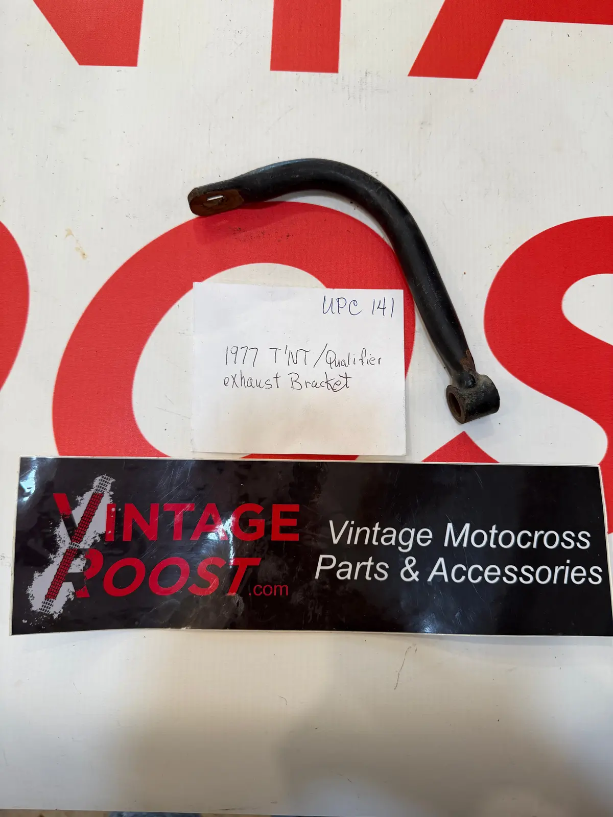 Can Am, 1977 Tnt/Qualifier Exhaust Bracket Used Parts, New! (Copy) 1